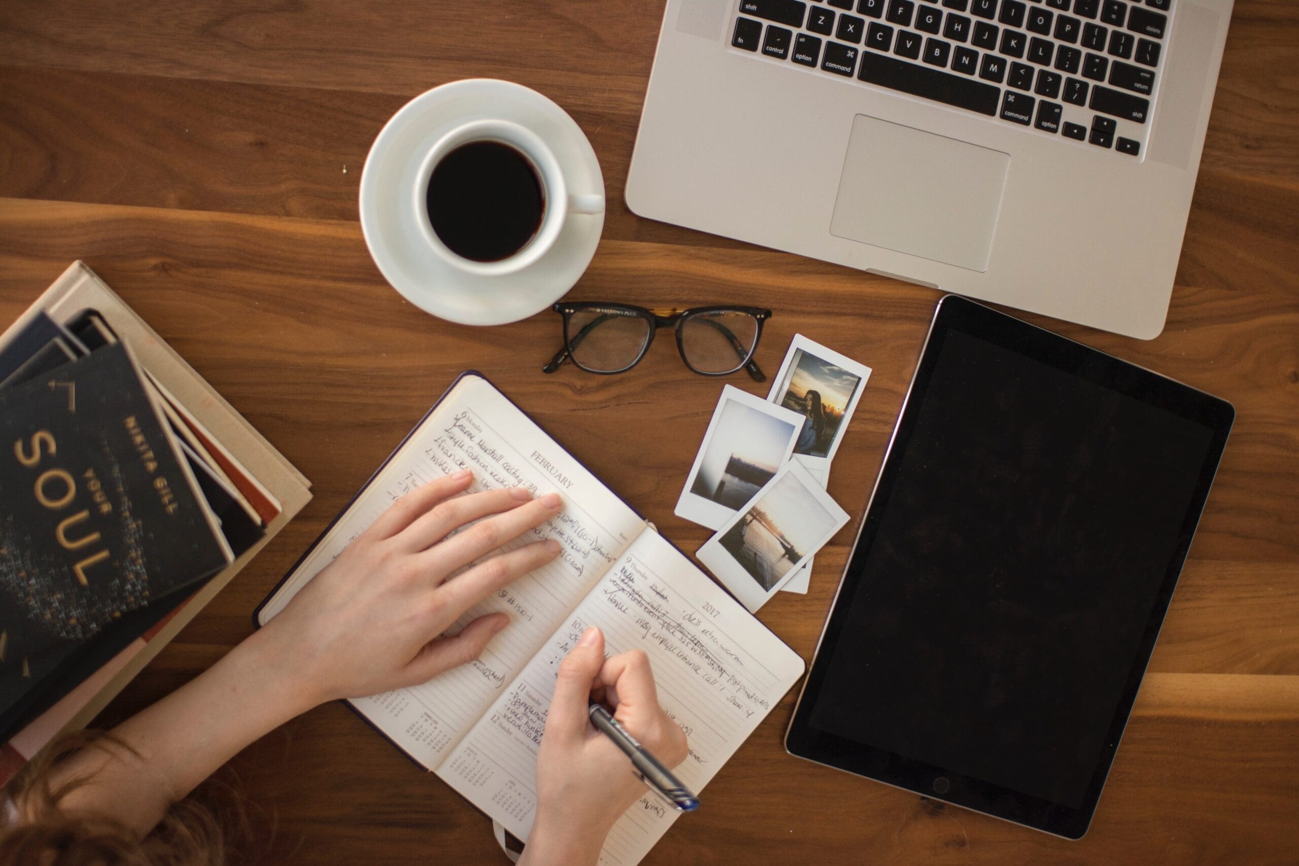 a person writes their interoception intention in a notebook